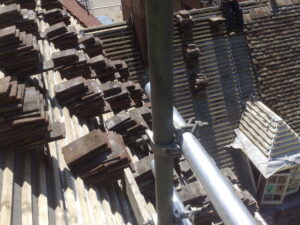 Tiles on roof stacked for laying